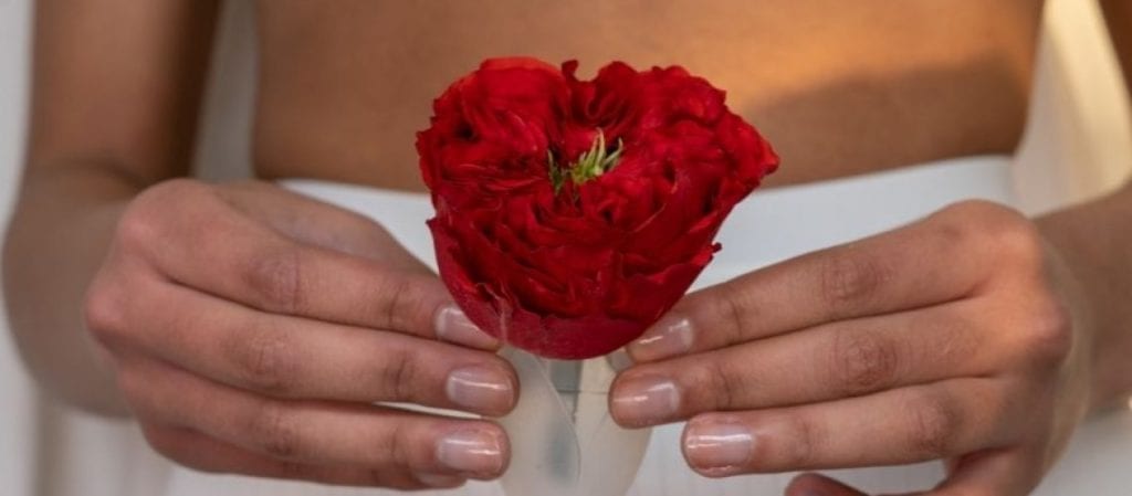 Woman-Holding-Red-Rose-and-Flow-Cup