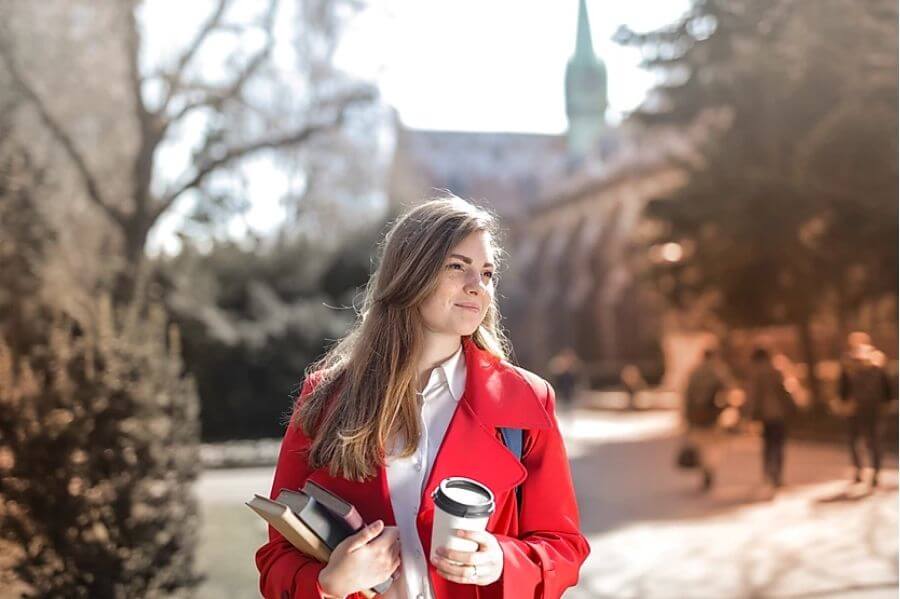 woman in red jacket with period