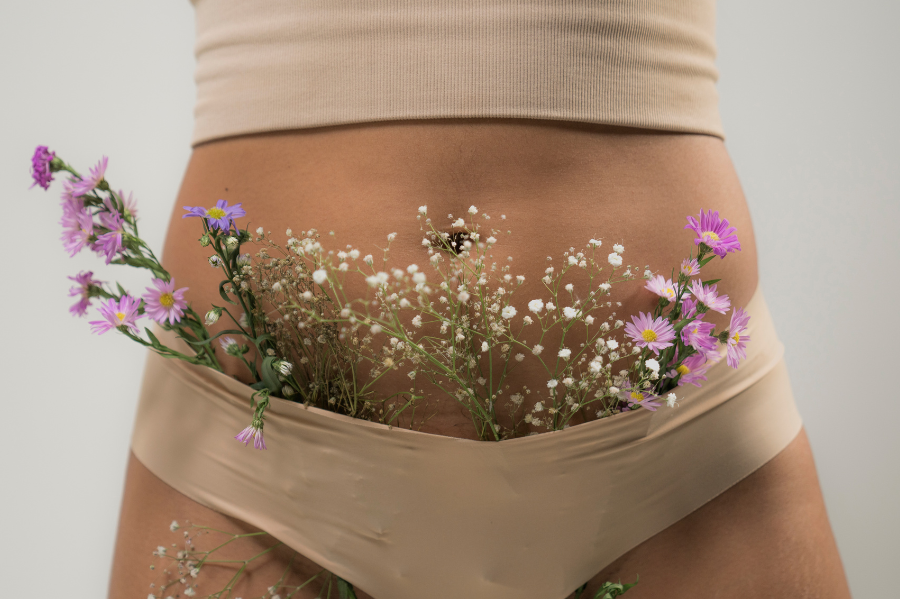 woman wearing brown panty with flowers full of estrogen